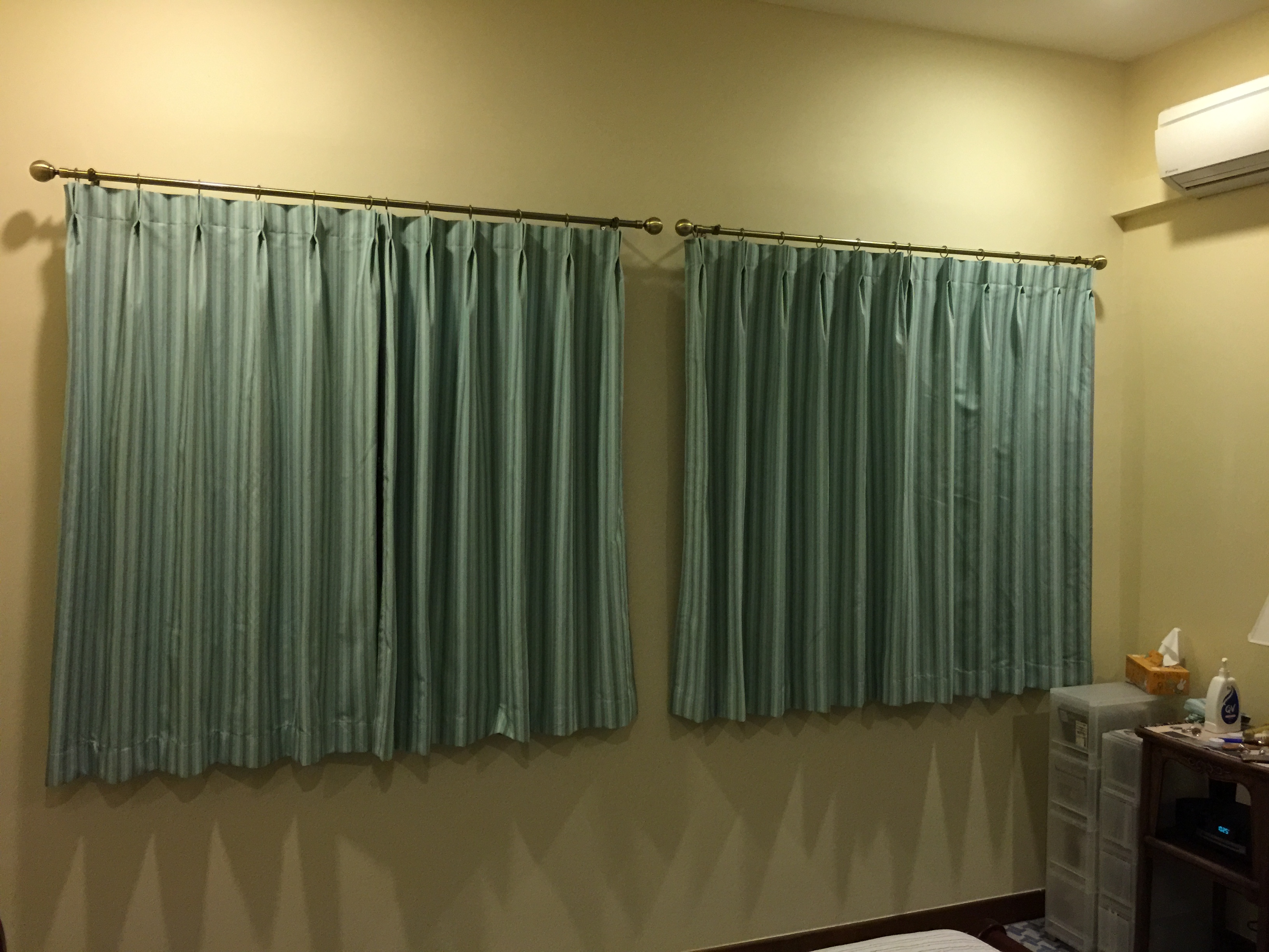 Curtain rods with decorative end cap for Singapore windows